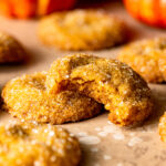 Close up of brown butter pumpkin sugar cookie with bite missing
