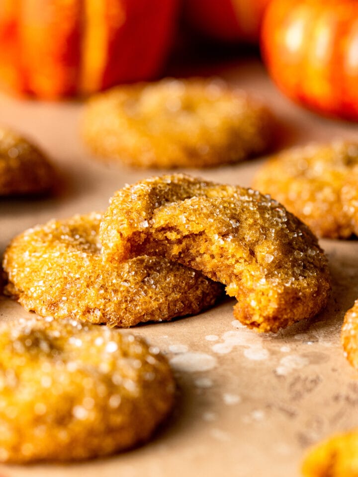Close up of brown butter pumpkin sugar cookie with bite missing