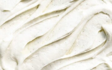 Close up of vanilla bean frosting swirls