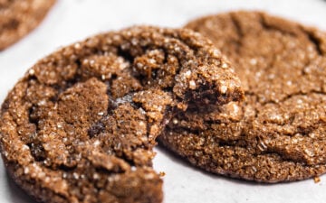 Close up of Drop-Style Chocolate Sugar Cookies with a bite missing from one