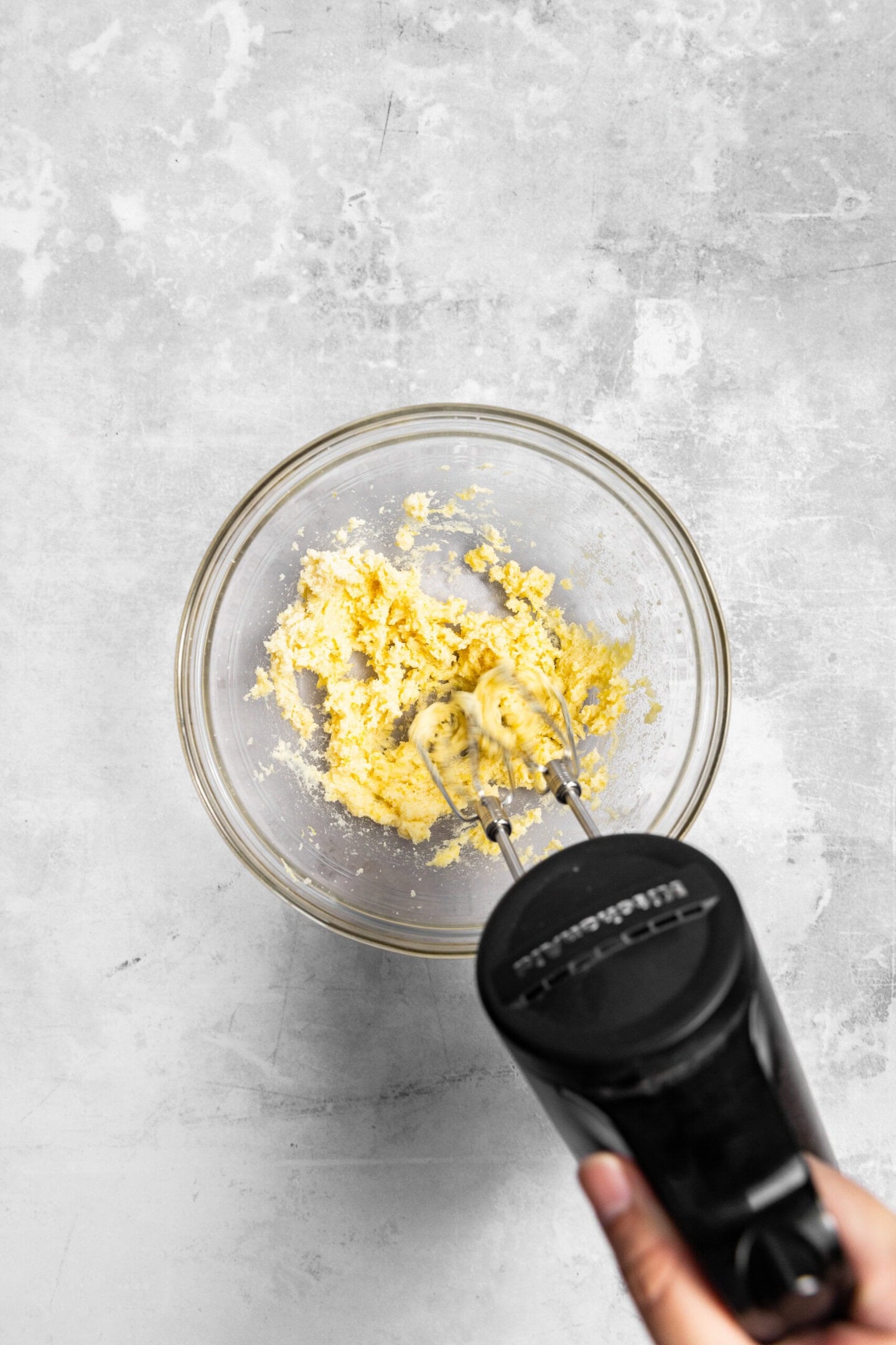 Butter and lemon sugar being creamed together