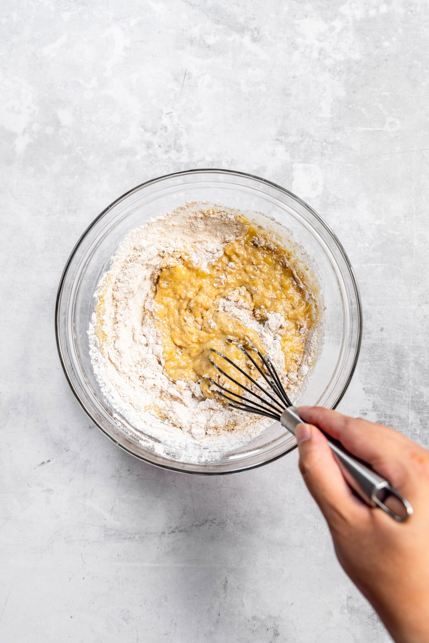 Dry ingredients being whisked into the wet ingredients