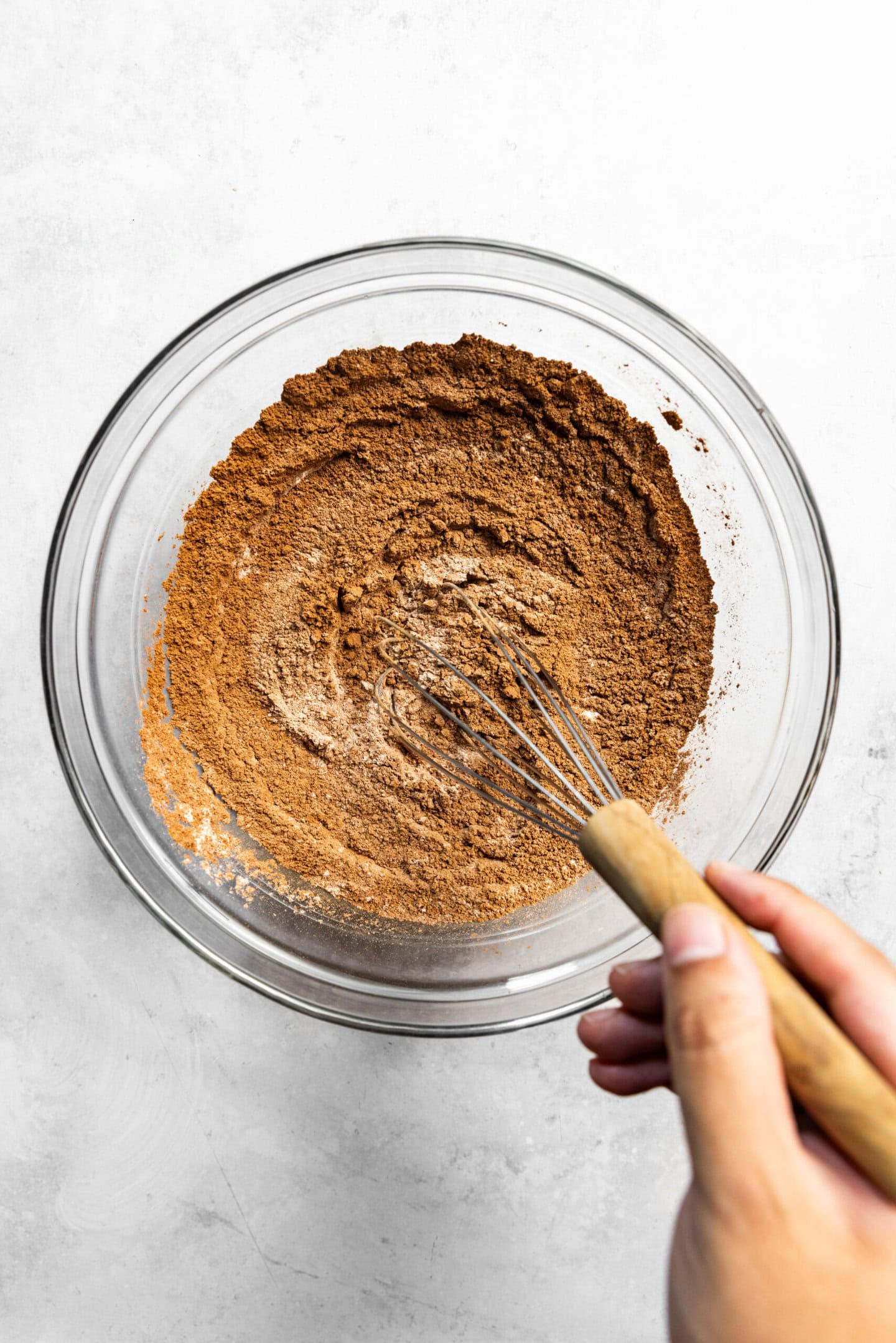 Dry ingredients being whisked together.